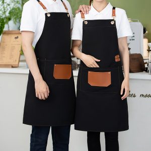 Ποδιά με τσέπη Polyester 64Χ78 εκ. Μαύρη με λεπτομέρειες PU - KESKOR 65700-1